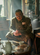 廖丰年(张懿曼饰演)