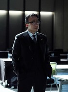 崔康石(李星民饰演)